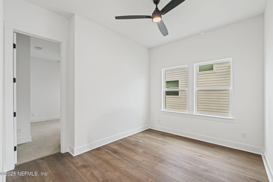 Spacious, unfurnished interior of a new home in Seven Pines 50' Rear Entry, Jacksonville (Image 58).