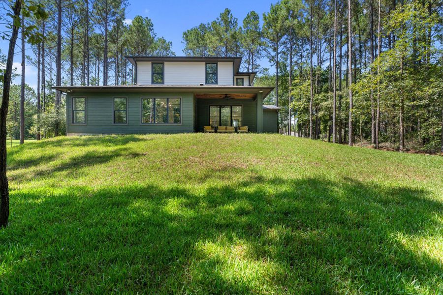 Front exterior of a new home in , Livingston, TX, highlighting curb appeal (Image 27).