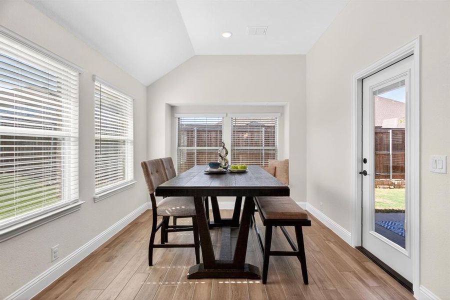 Generous breakfast nook with lots of windows, natural light, and a great window seat. Generous breakfast nook with lots of windows, natural light, and a great window seat.