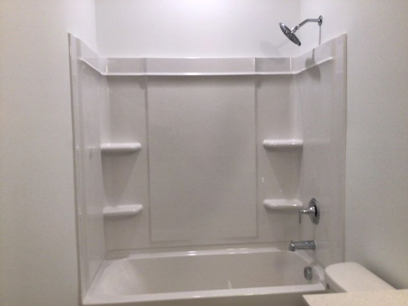 Bath 2 featuring the AW Collection® Coastal - Bright with white cabinets and quartz countertops.