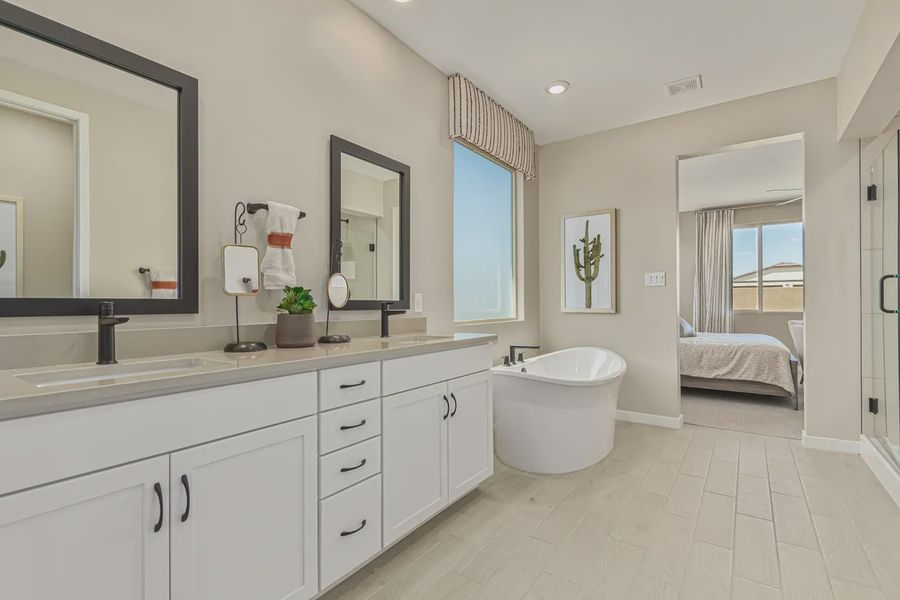 Representative furnished interior of a home built from the 2257 by Elliott Homes in Acacia at Santana, Yuma (Image 24).