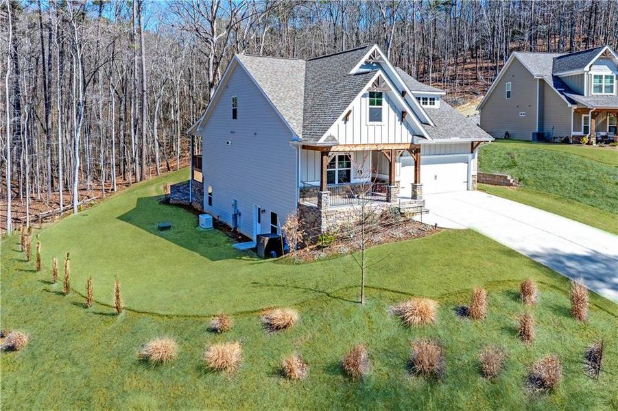 Front exterior of a new home in , Waleska, GA, highlighting curb appeal (Image 2). Front exterior of a new home in , Waleska, GA, highlighting curb appeal (Image 2).