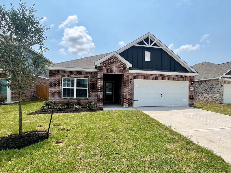 Front exterior of a new home in Freeman Ranch, Katy, TX, highlighting curb appeal (Image 1).