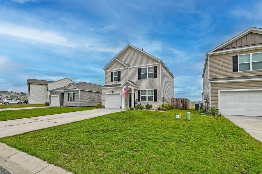 Front exterior of a new home in , Summerville, SC, highlighting curb appeal (Image 21).