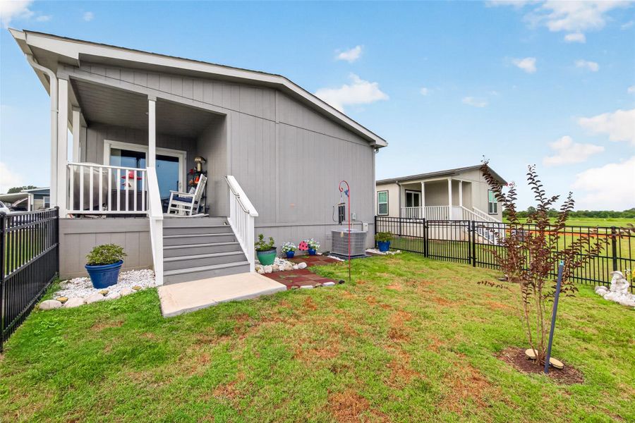 Exterior details and patio area of a home in , Willis (Image 23).