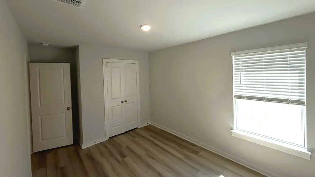 Furnished interior view inside a new home in Sky Ridge, San Marcos (Image 17).