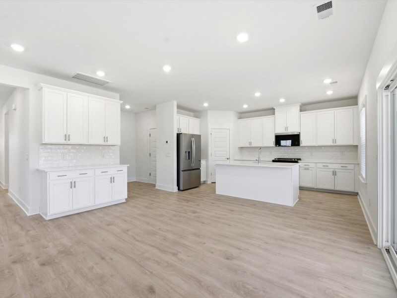 Furnished interior view inside a new home in The Coves at Lakes of Cane Bay II, Summerville (Image 4).