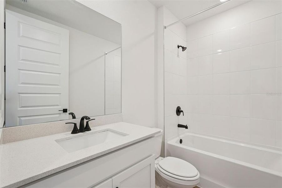 Furnished interior view inside a new home in Oakfield Trails - Signature Series, Parrish (Image 6).