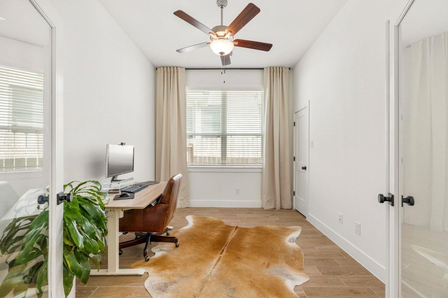 Bright home office with glass French doors, featuring a large walk-in closet to easily serve as a 4th bedroom. Bright home office with glass French doors, featuring a large walk-in closet to easily serve as a 4th bedroom.