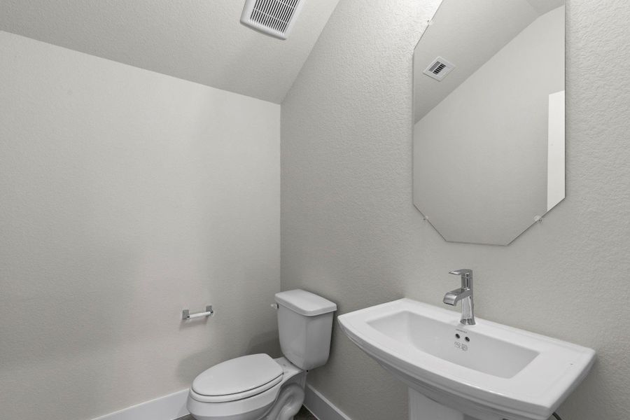 Furnished interior view inside a new home in Barton Creek Ranch, Conroe (Image 6).