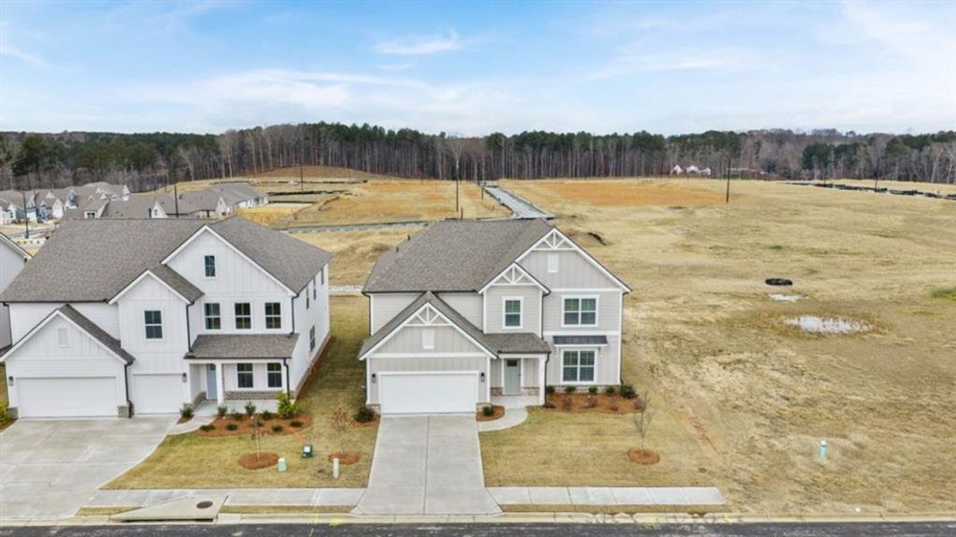 Front exterior of a new home in Hamptons at Riverwood East, Dallas, GA, highlighting curb appeal (Image 23). Front exterior of a new home in Hamptons at Riverwood East, Dallas, GA, highlighting curb appeal (Image 23).