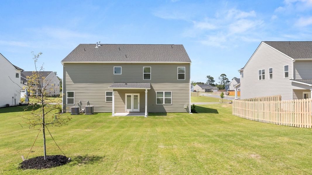 Front exterior of a new home in Southwind Village, Evans, GA, highlighting curb appeal (Image 19).