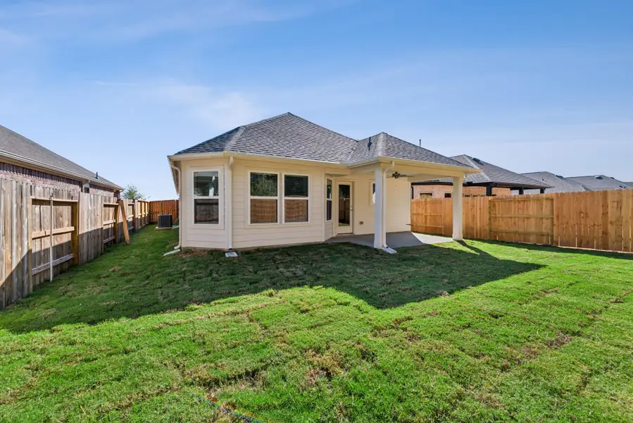 Exterior details and patio area of a home in Sorella, Tomball (Image 1).