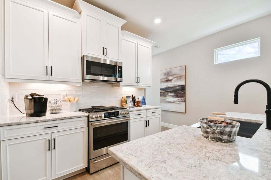 Representative furnished interior of a home built from the Sandpiper by William Ryan Homes in Fairway Pointe - Villa Community, Sun City Center (Image 16).