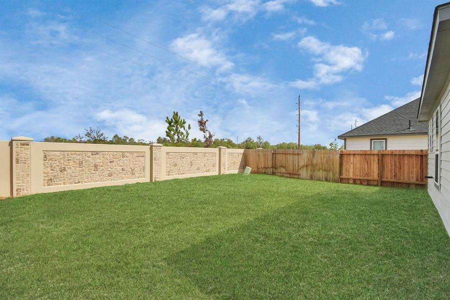 Backyard retreat, offering an abundance of space for kids to play and explore. The possibilities are endless in this outdoor haven, where the joy of open-air activities and family gatherings awaits.