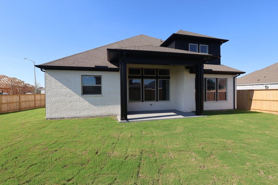 Exterior details and patio area of a home in Meridiana - Ascent Collection, Manvel (Image 4).