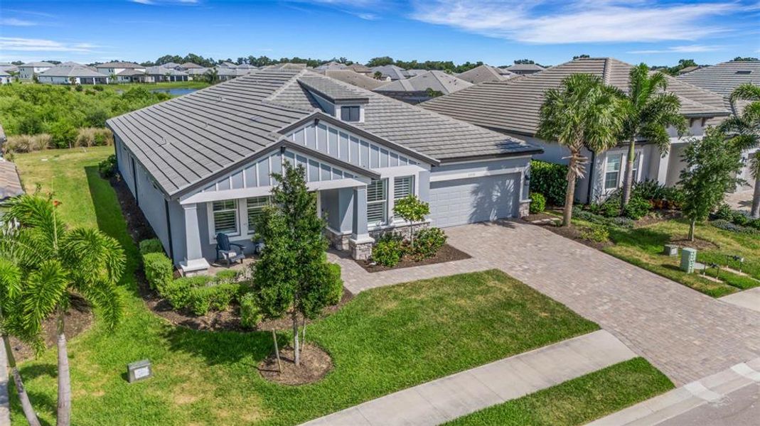 Front exterior of a new home in , Bradenton, FL, highlighting curb appeal (Image 26).
