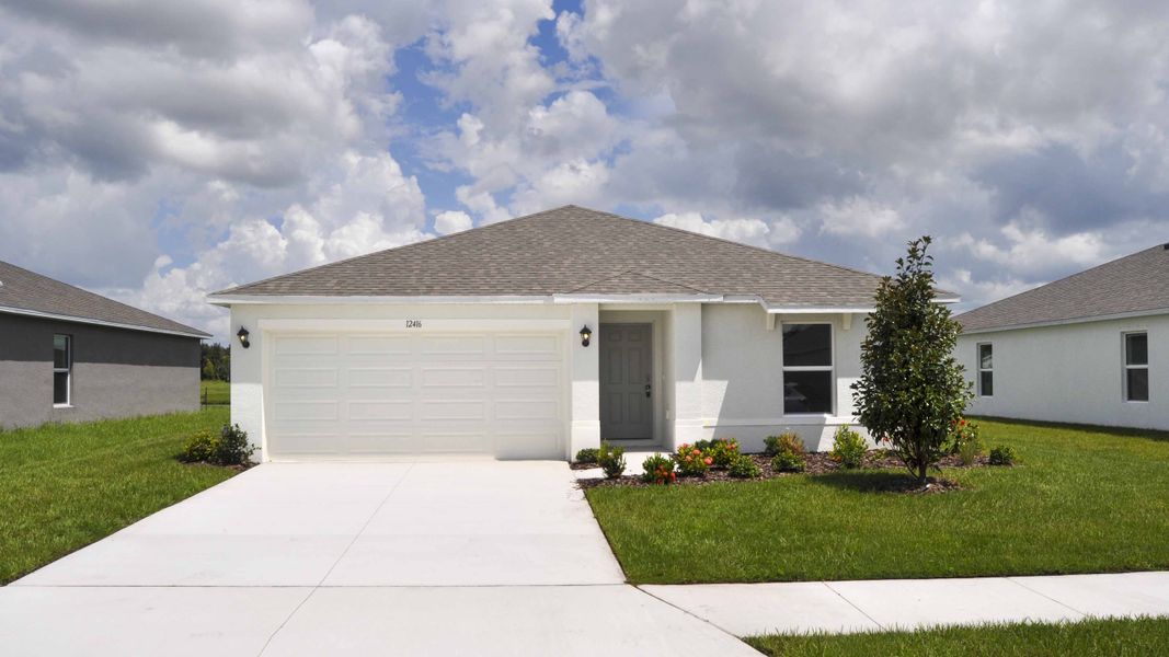 Front exterior of a new home in Oakfield Lakes, Parrish, FL, highlighting curb appeal (Image 1). Front exterior of a new home in Oakfield Lakes, Parrish, FL, highlighting curb appeal (Image 1).