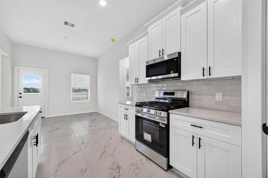 Furnished interior view inside a new home in Foxtail Palms, Manvel (Image 6).