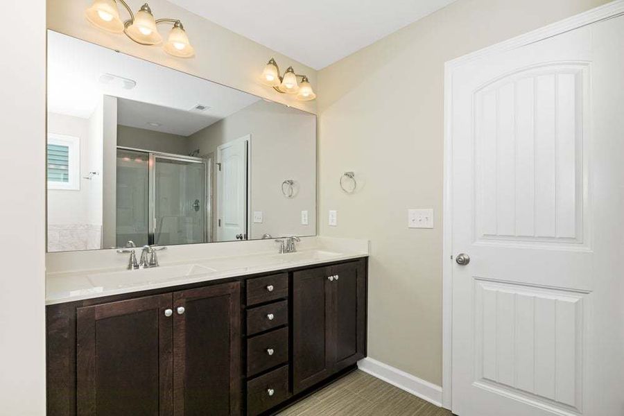Representative furnished interior of a home built from the Drayton by Caviness & Cates Communities in Bartlett Manor, Youngsville (Image 55).