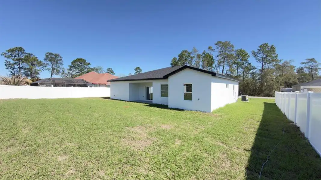 Exterior details and patio area of a home in , Ocala (Image 3).