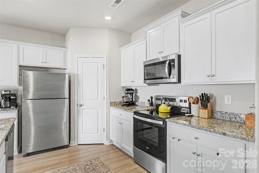 Furnished interior view inside a new home in McKee Creek Village, Charlotte (Image 29).