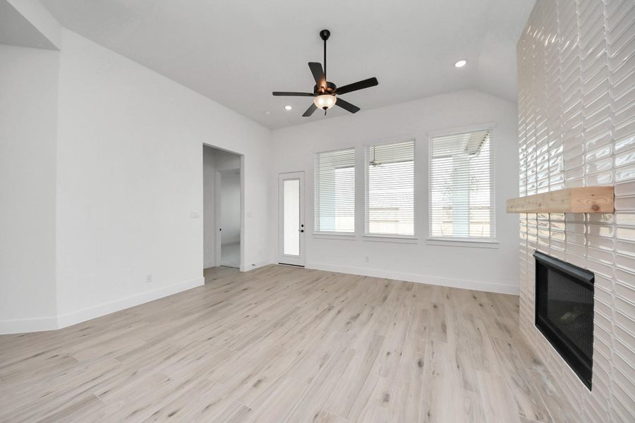 Spacious, unfurnished interior of a new home in Meridiana Courtyard Collection, Manvel (Image 22).