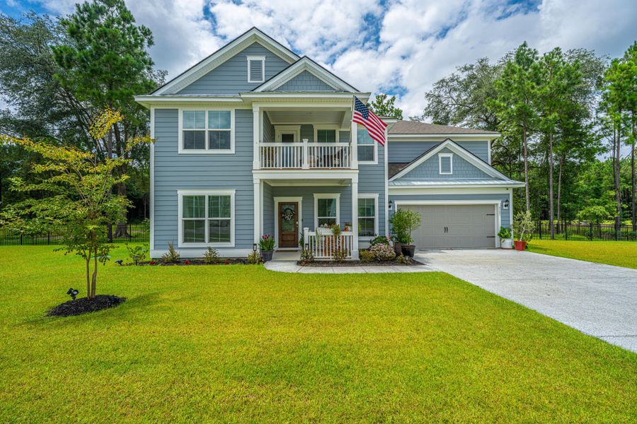 Front exterior of a new home in Sea Island Preserve, Johns Island, SC, highlighting curb appeal (Image 18).