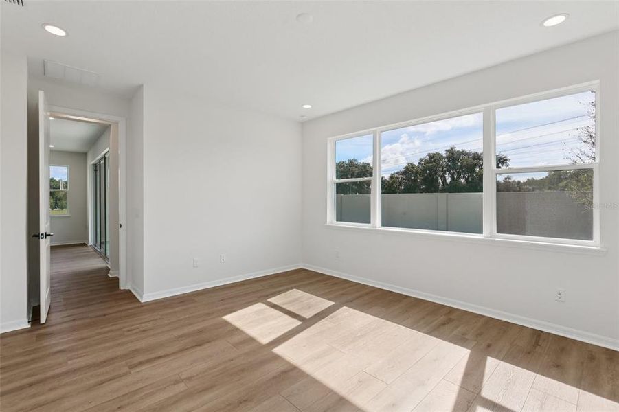 Spacious, unfurnished interior of a new home in Primrose at Longleaf, New Port Richey (Image 40).