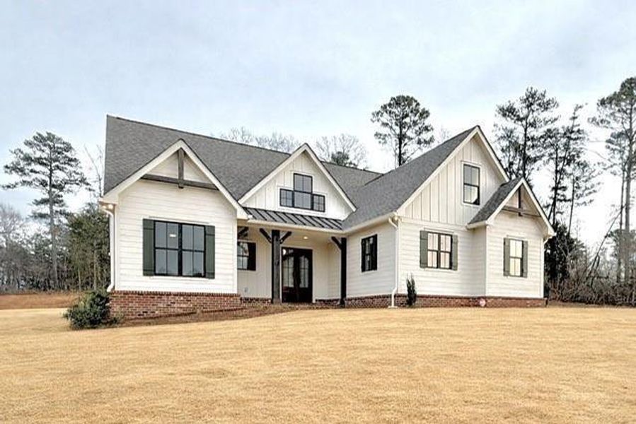 Front exterior of a new home in , Rydal, GA, highlighting curb appeal (Image 1). Front exterior of a new home in , Rydal, GA, highlighting curb appeal (Image 1).