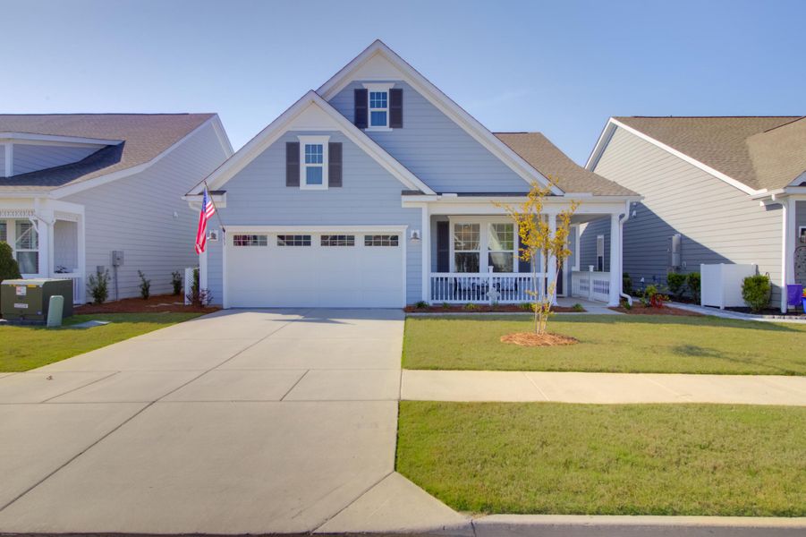 Front exterior of a new home in Cresswind Charleston, Summerville, SC, highlighting curb appeal (Image 24).