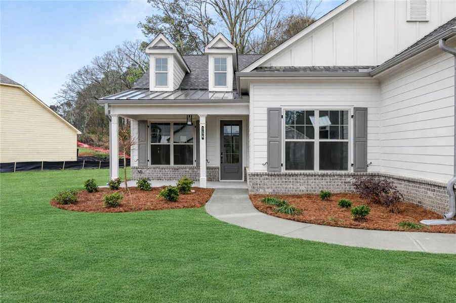 Exterior details and patio area of a home in Soleil Belmont Park, Canton (Image 25).