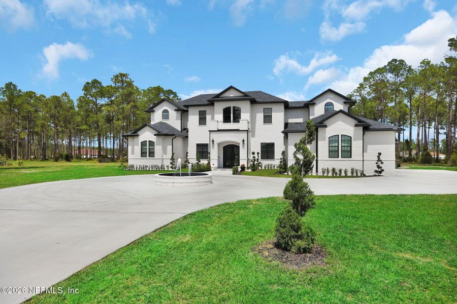 Front exterior of a new home in , Jacksonville, FL, highlighting curb appeal (Image 24).