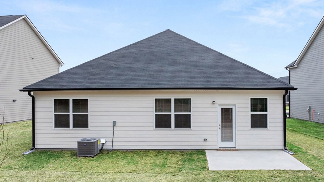 Exterior details and patio area of a home in Highland Hills, Graniteville (Image 2).