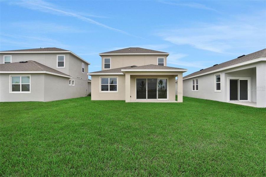 Exterior details and patio area of a home in Turnleaf, Punta Gorda (Image 4).