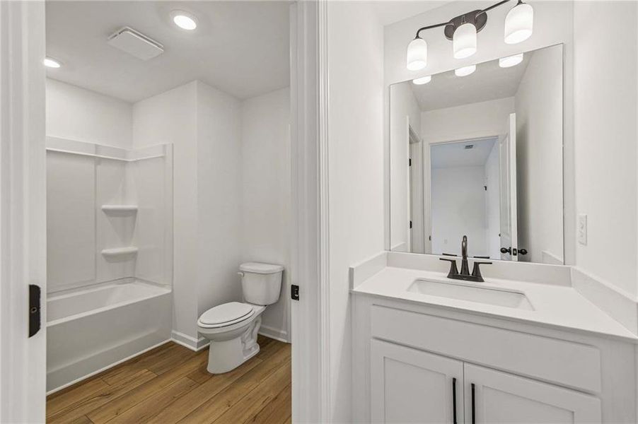 Furnished interior view inside a new home in Eastlyn Crossing, Flowery Branch (Image 15).