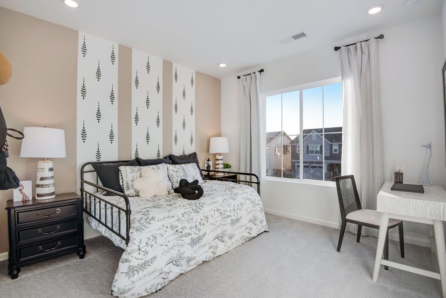 Furnished interior view inside a new home in Reunion, Commerce City (Image 13).