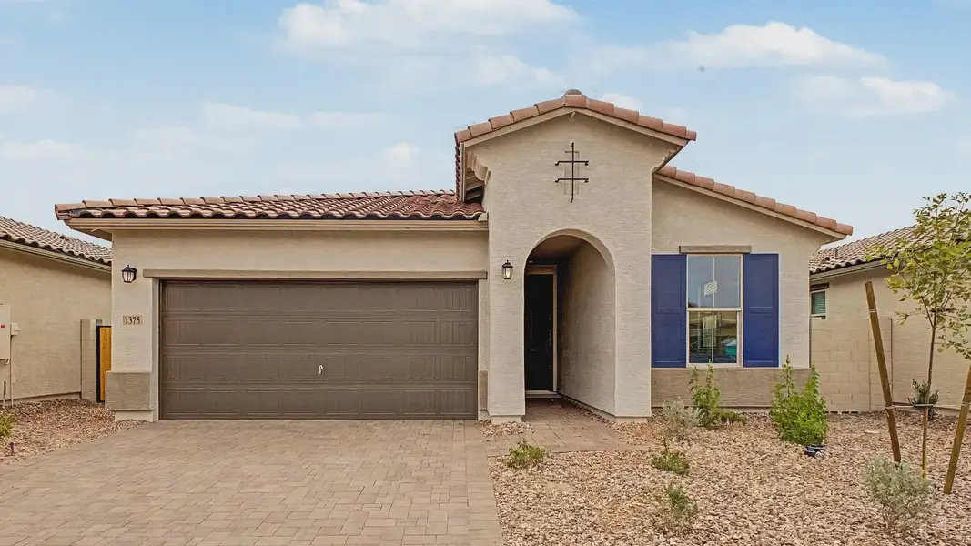 Front exterior of a new home in The Villas at Mystic, Peoria, AZ, highlighting curb appeal (Image 1). Front exterior of a new home in The Villas at Mystic, Peoria, AZ, highlighting curb appeal (Image 1).
