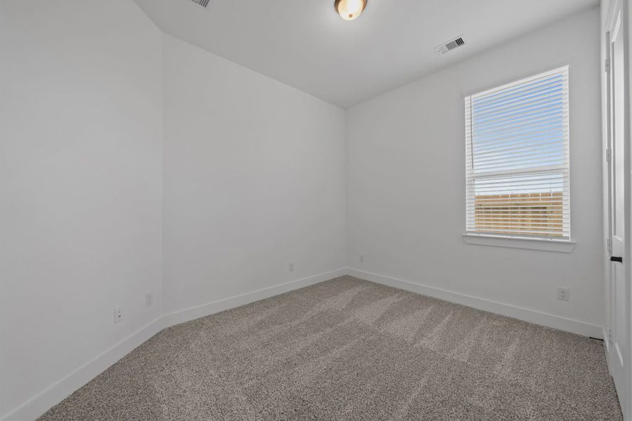 Representative unfurnished interior of a home built from the Augusta by Chesmar Homes in Riceland Alley Loads, Mont Belvieu (Image 24).