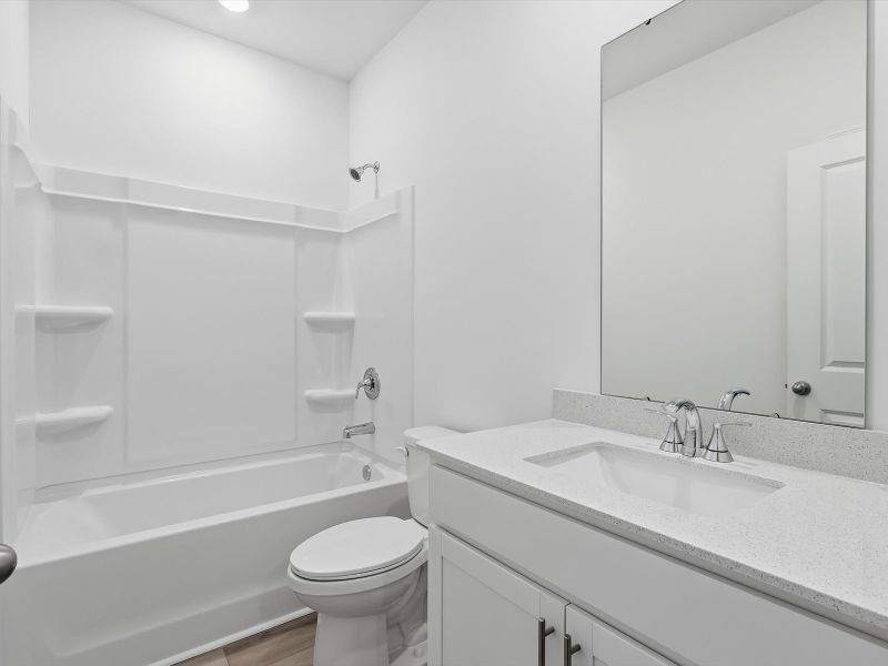Furnished interior view inside a new home in Palmetto Place, Longs (Image 9).