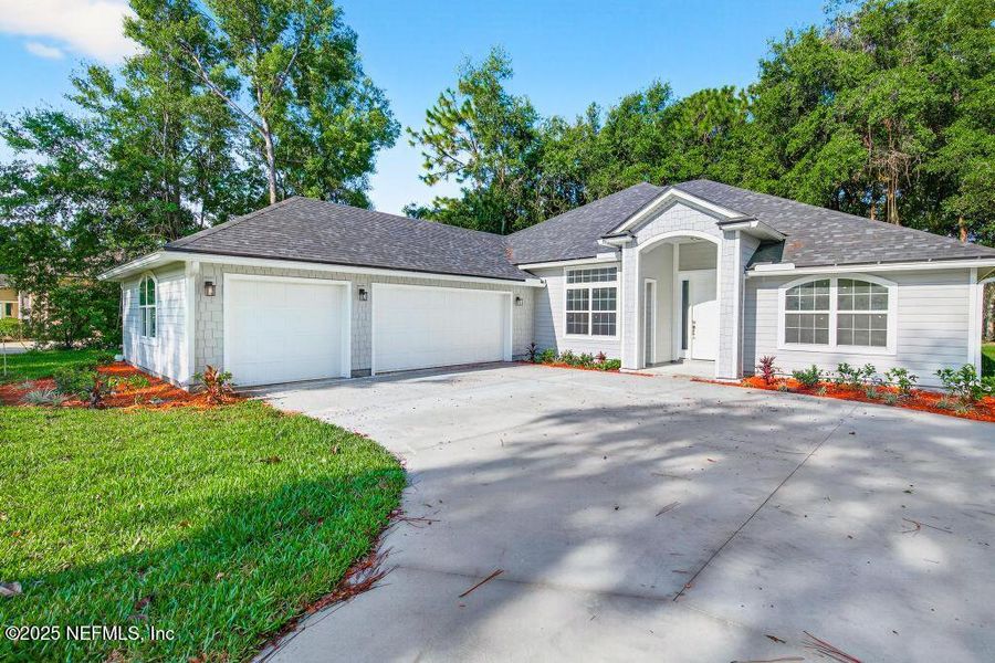 Front exterior of a new home in , Jacksonville, FL, highlighting curb appeal (Image 29). Front exterior of a new home in , Jacksonville, FL, highlighting curb appeal (Image 29).
