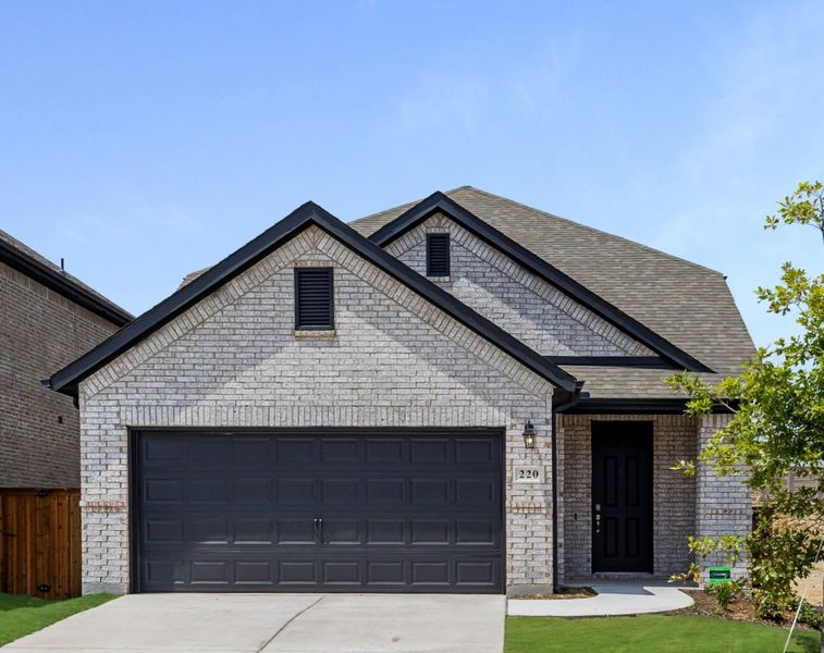 Representative exterior photo of a completed home built from the Tucker by UnionMain Homes in Elevon, Lavon, TX (Image 2).