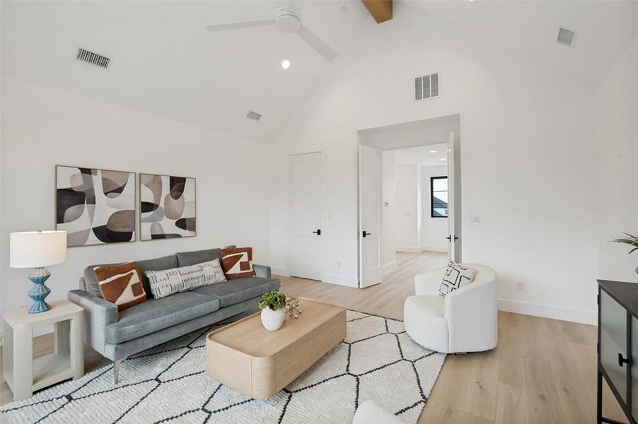 Vaulted ceiling featuring a ceiling fan and recessed lighting
