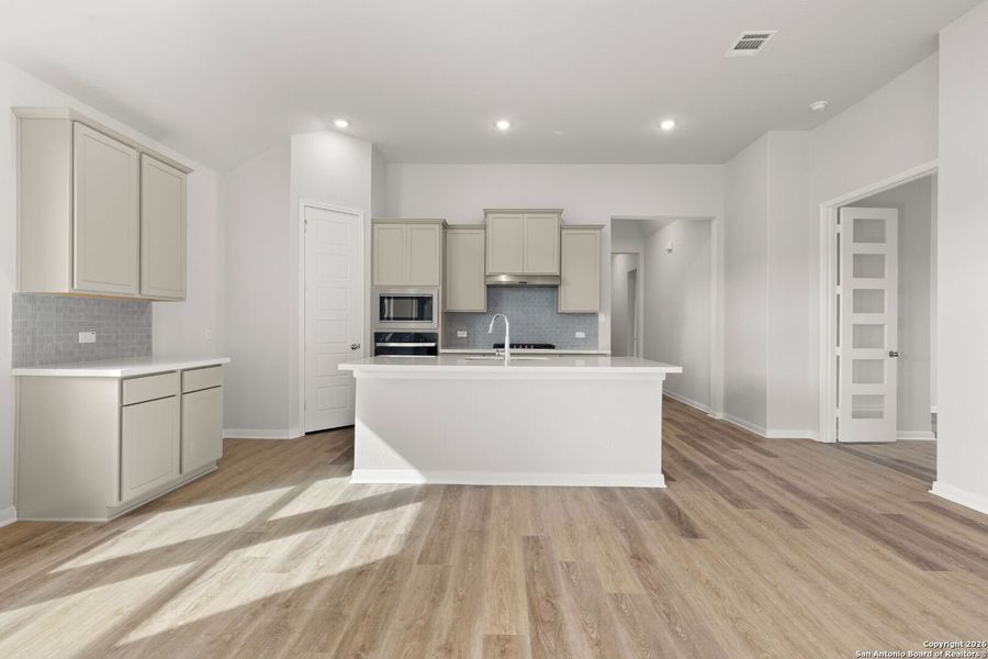 Furnished interior view inside a new home in Homestead 65', Schertz (Image 5).