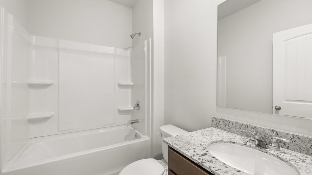 Representative furnished interior of a home built from the Hayden by D.R. Horton in Northwoods at Mirror Lake, Villa Rica (Image 10).