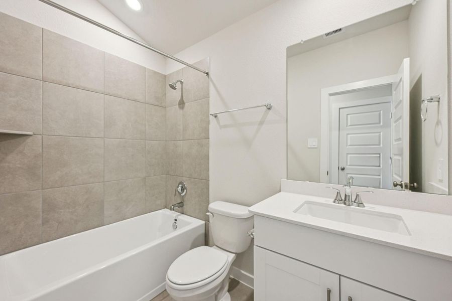 Furnished interior view inside a new home in Landing Meadows - Premier Series, New Caney (Image 9). Furnished interior view inside a new home in Landing Meadows - Premier Series, New Caney (Image 9).