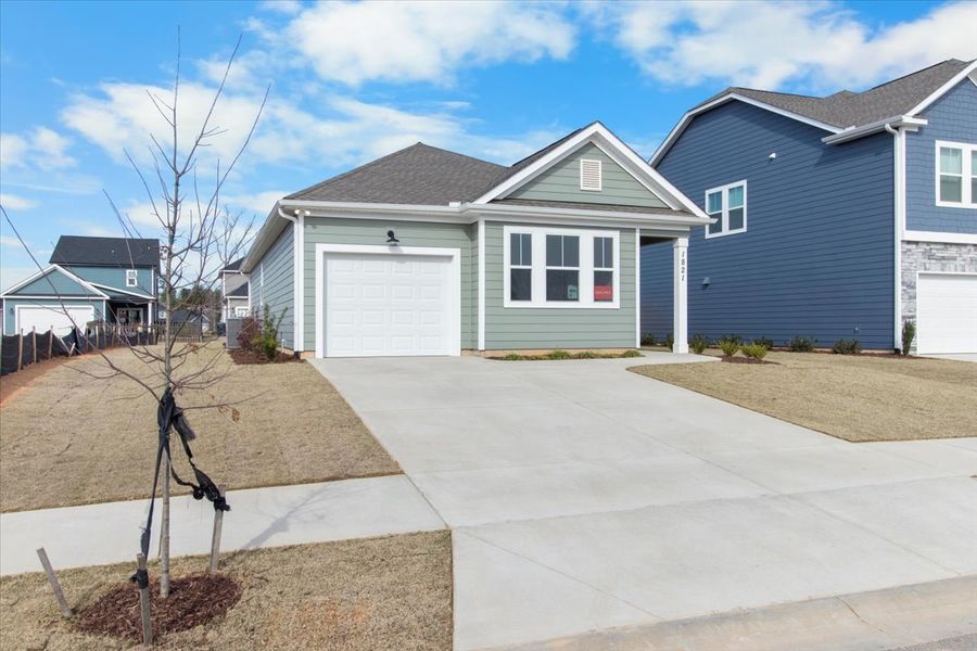 Front exterior of a new home in Tillery Park, Grovetown, GA, highlighting curb appeal (Image 24). Front exterior of a new home in Tillery Park, Grovetown, GA, highlighting curb appeal (Image 24).