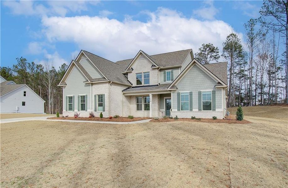 Front exterior of a new home in Saddleridge, Senoia, GA, highlighting curb appeal (Image 16).
