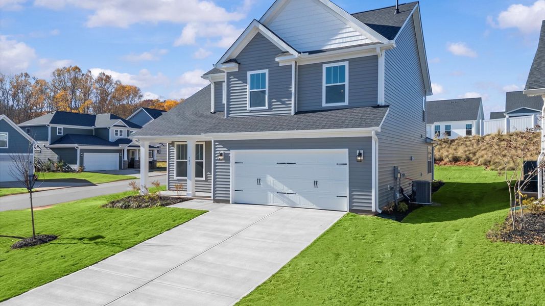 Front exterior of a new home in Fox Hollow, Spartanburg, SC, highlighting curb appeal (Image 2).