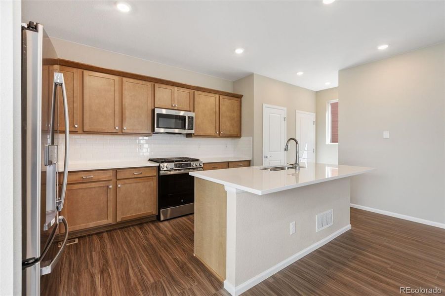 Furnished interior view inside a new home in Woodrose at Painted Prairie, Aurora (Image 8).